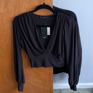 Medium black, deep v cut crop top from Saints